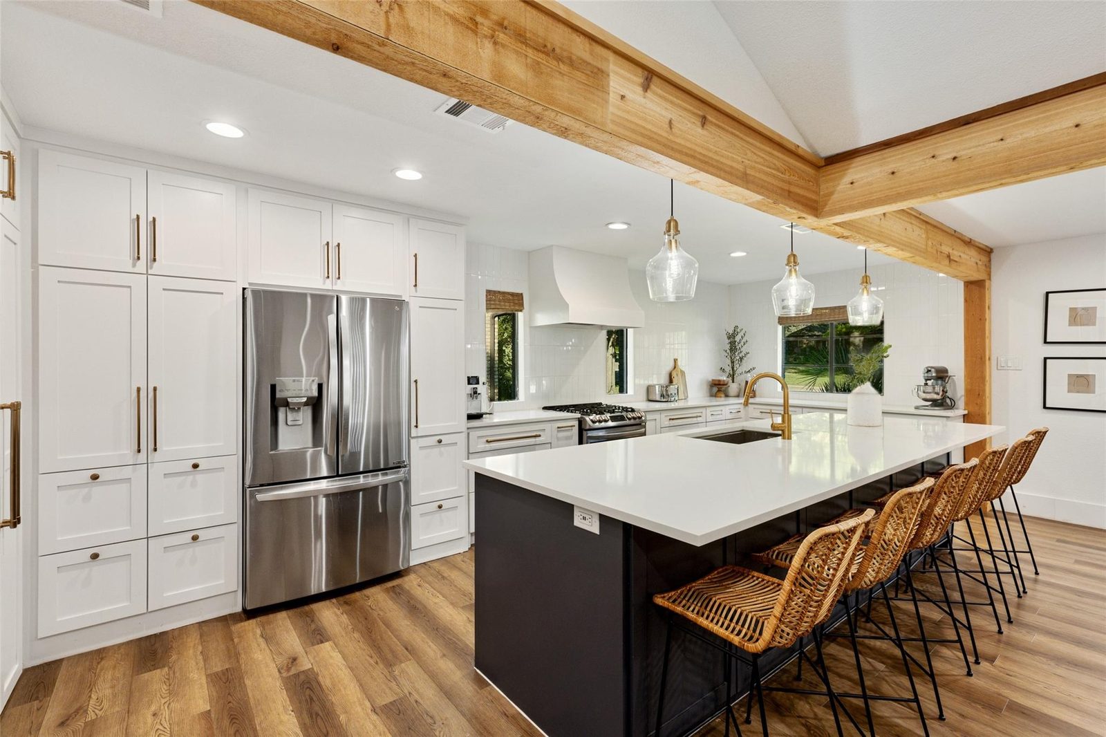 Rockwall kitchen after renovation with custom white cabinetry and large island