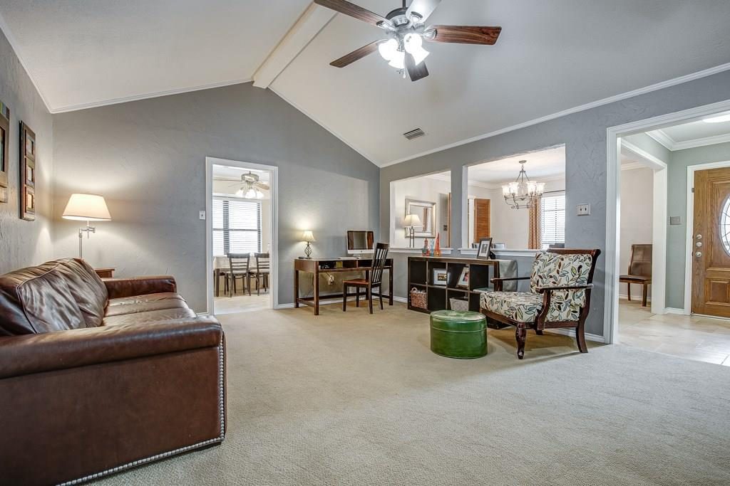 Before: gray walls, carpet, closed-off doorways